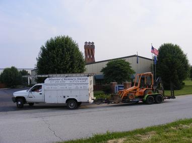 Hoosier Chimney Sweep,Inc. working at the CSIA school digging footers for new chimneys to be built for training purposes 