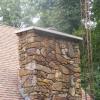Installed new concrete crown on a stone chimney in Dubois, Indiana.