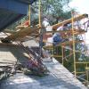 Building a chimney that had been knocked over during a storm. 