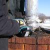 Connecting another section of insulated liner to the fist section that was installed. Jasper, Indiana.