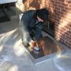 Cutting hole in the top of the chase cover to mount a support plate to the top of chase cover. Jasper, Indiana.  