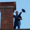 Chimney sweeping in Owensboro, Kentucky.