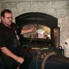 Running a video camera up inside the chimney to look for any defects. Indianapolis, Indiana.