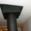 After we installed the chimney we installed the trim collar and connector pipe to the stove. Paoli, Indiana. 